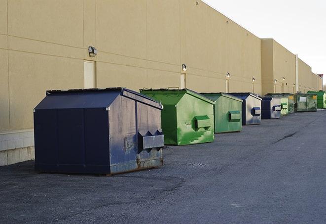 dumpsters lined up waiting to be filled with construction waste in Bowling Green VA